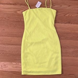 Neon yellow mini bodycon dress